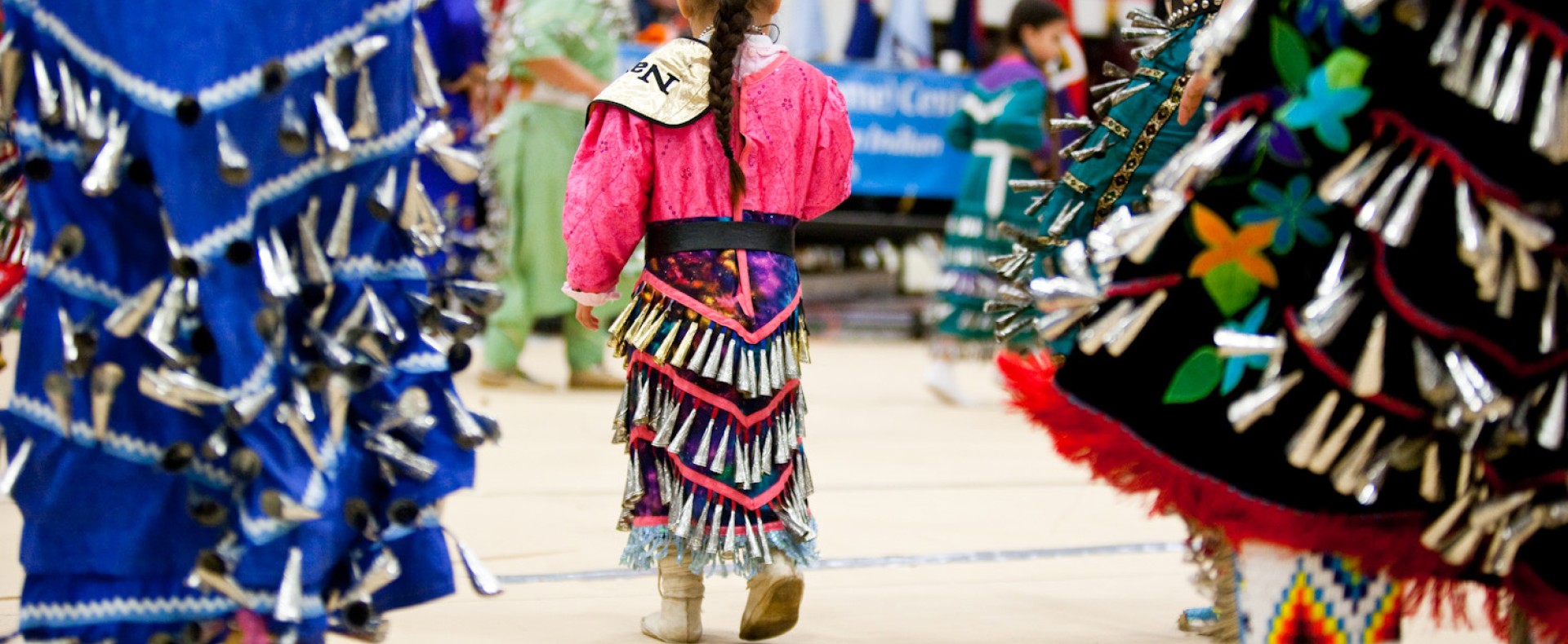 Youth-focused jingle dress picture at Powwow
